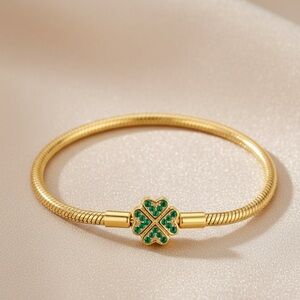 Elegant Gold Bracelet with Green Clover Charm